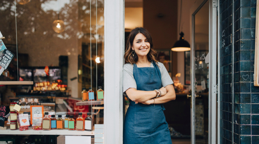 Small business owner using loan from community bank